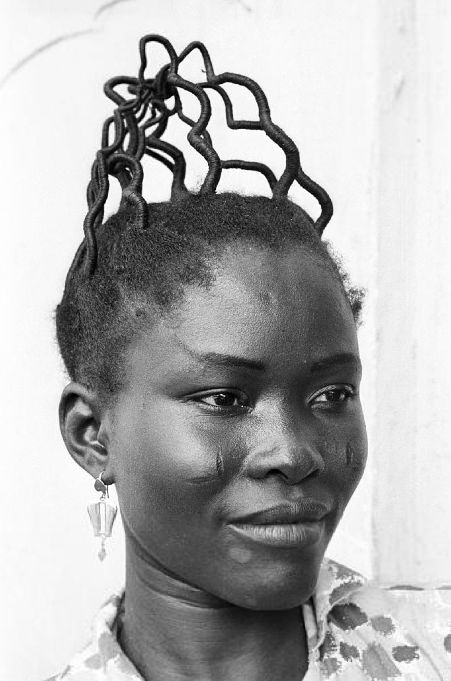 An image of a woman with African threading.